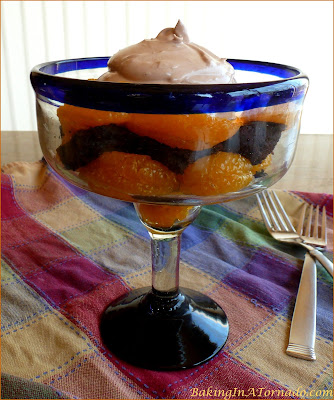 Mandarin Brownie Parfait with Nutella Whipped Cream, a rich dense brownie layered with refreshing mandarin oranges and topped with a Nutella infused whipped cream | Recipe developed by www.BakingInATornado.com | #recipe #dessert #chocolate