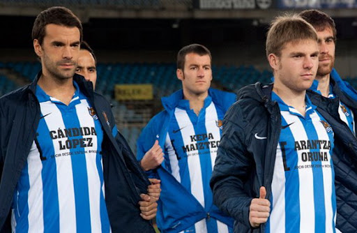 Real Sociedad players have a message for their fans: 'We carry you on our shirts'