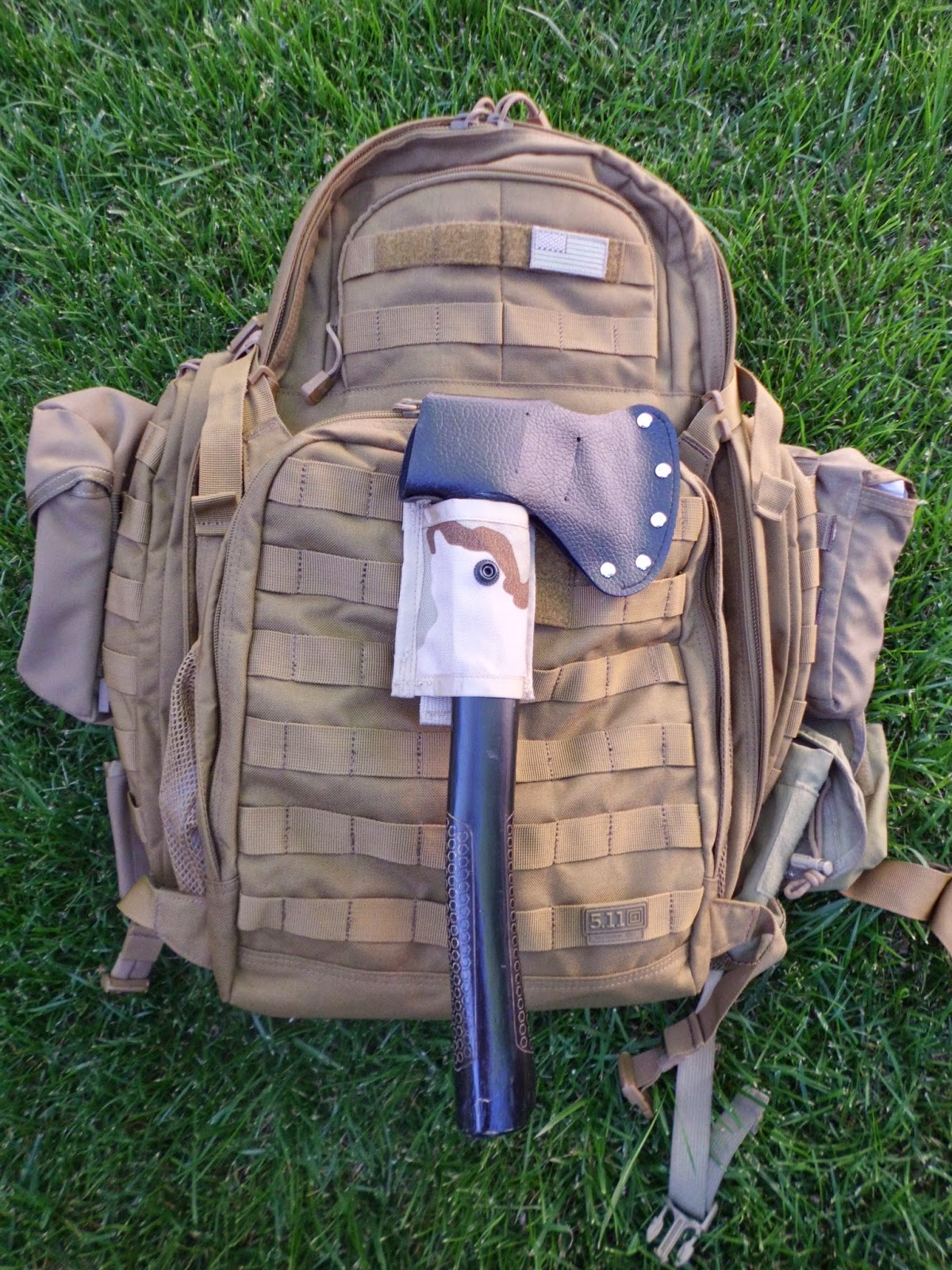 The Tactical Outdoorsman How to carry a hatchet on a MOLLE pack.
