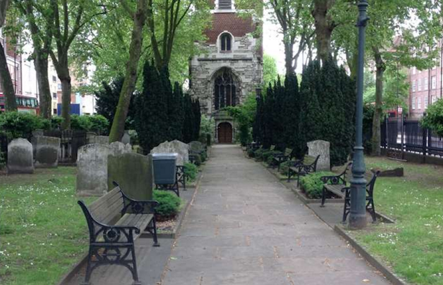 Looking through St Mary's, Bow churchyard towards the church's Tower