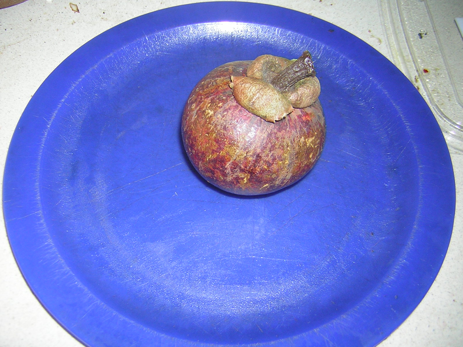 How much mangosteen juice per day image