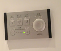 Toilet control with Braille labels