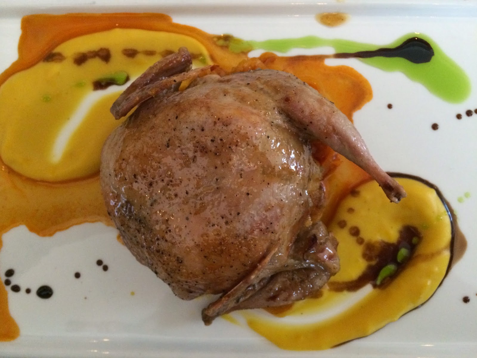 The Oyster Stuffed Quail over Pumpkin Purée at Le Foret in New Orleans