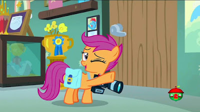 Scootaloo winking, wearing a camera around her neck