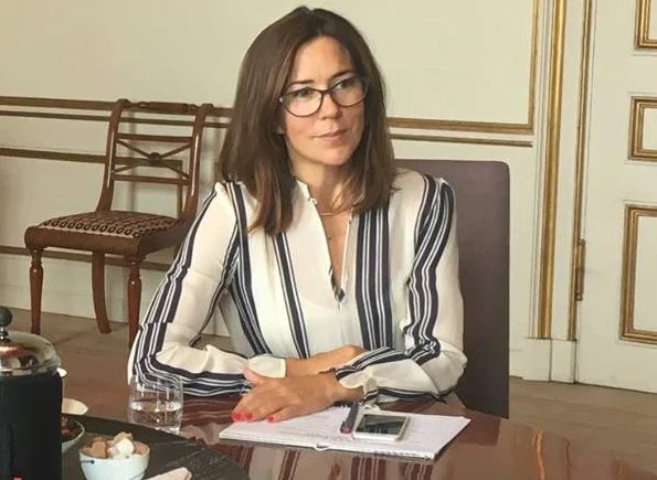 Crown Princess Mary got glasses. wore a Hugo Boss line silk blouse at Princess Mary Foundation meeting 
