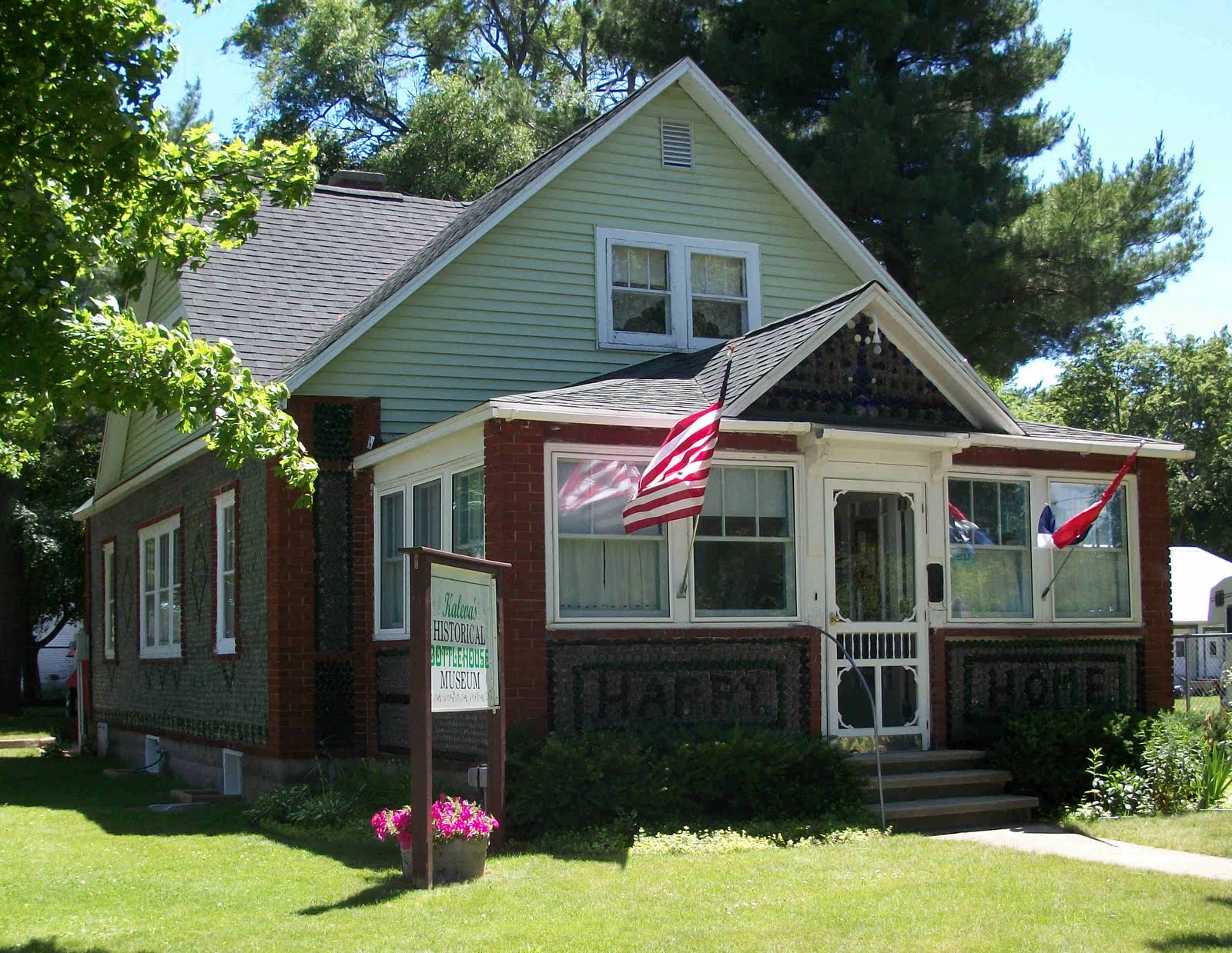 Amazing Recycled Products Soda Bottle Houses
