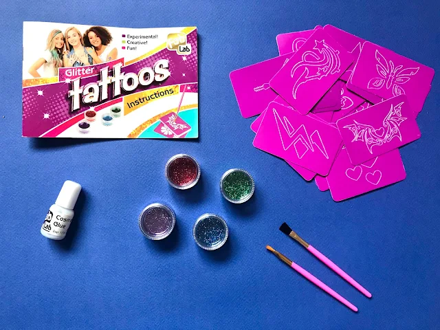 Flatlay showing contents of the FabLab glitter tattoo kit