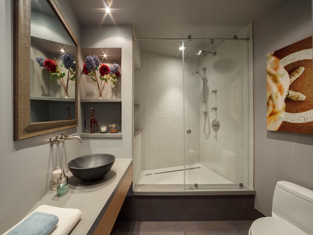 Picture of contemporary bathroom interiors with corner shower cabin and modern sink