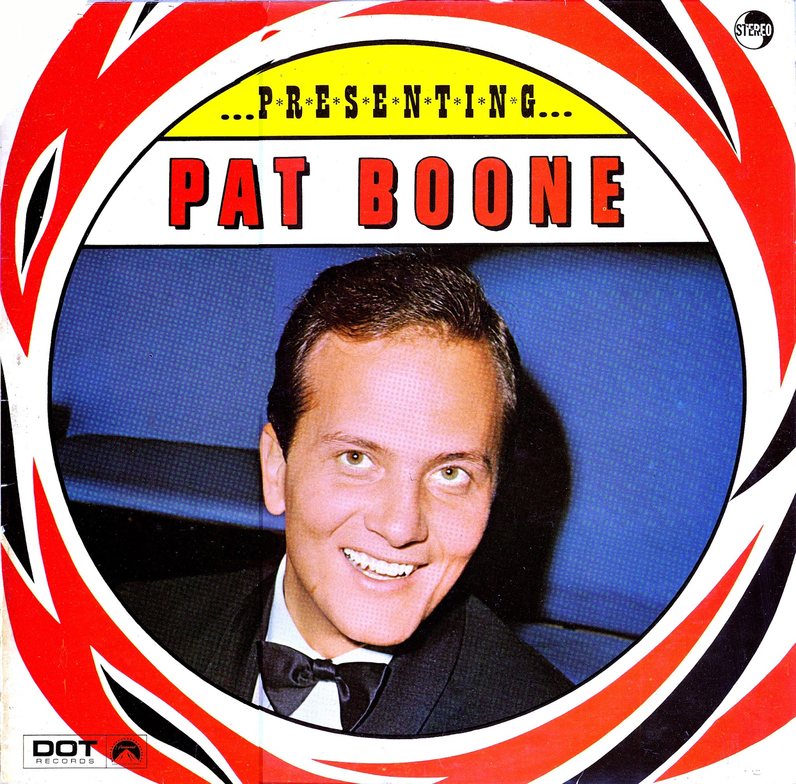 Present pats. Pat Boone smile.