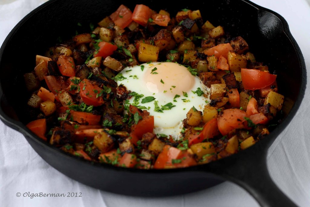 Mango And Tomato Mexican Breakfast Chorizo Potato And An Egg In An Cast Iron Skillet