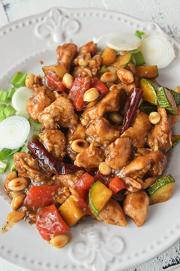 Kung pao chicken with bell pepper,zucchini,peanuts and red chilis