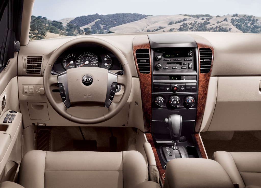 AutoSleek "2003 Kia Sorento CD Charger Problems"