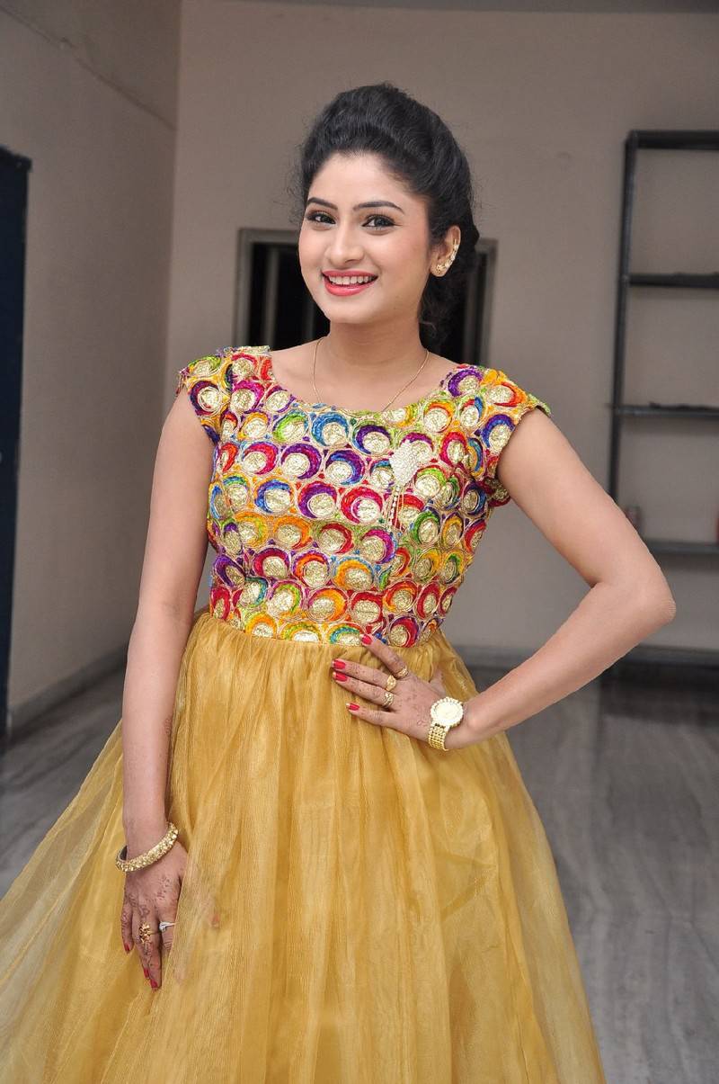 Actress Vishnu Priya Stills In Yellow Dress Audio Launch
