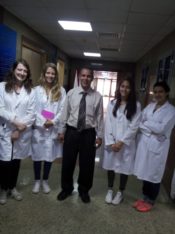 Dr. Alaa Mosbah with medical students from UK
