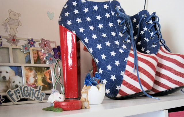 very high heeled boots red white blue