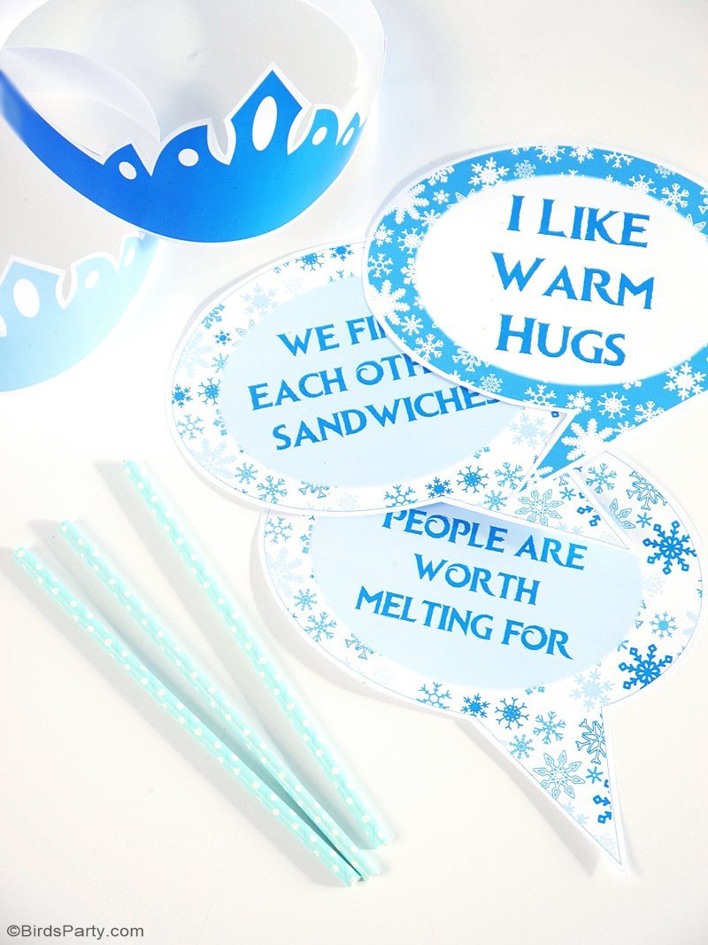 DIY Frozen Inspired Party Photo Booth - decor ideas to set this quick and simple photo with printable props for a Frozen birthday party or winter celebration! | BirdsParty.com