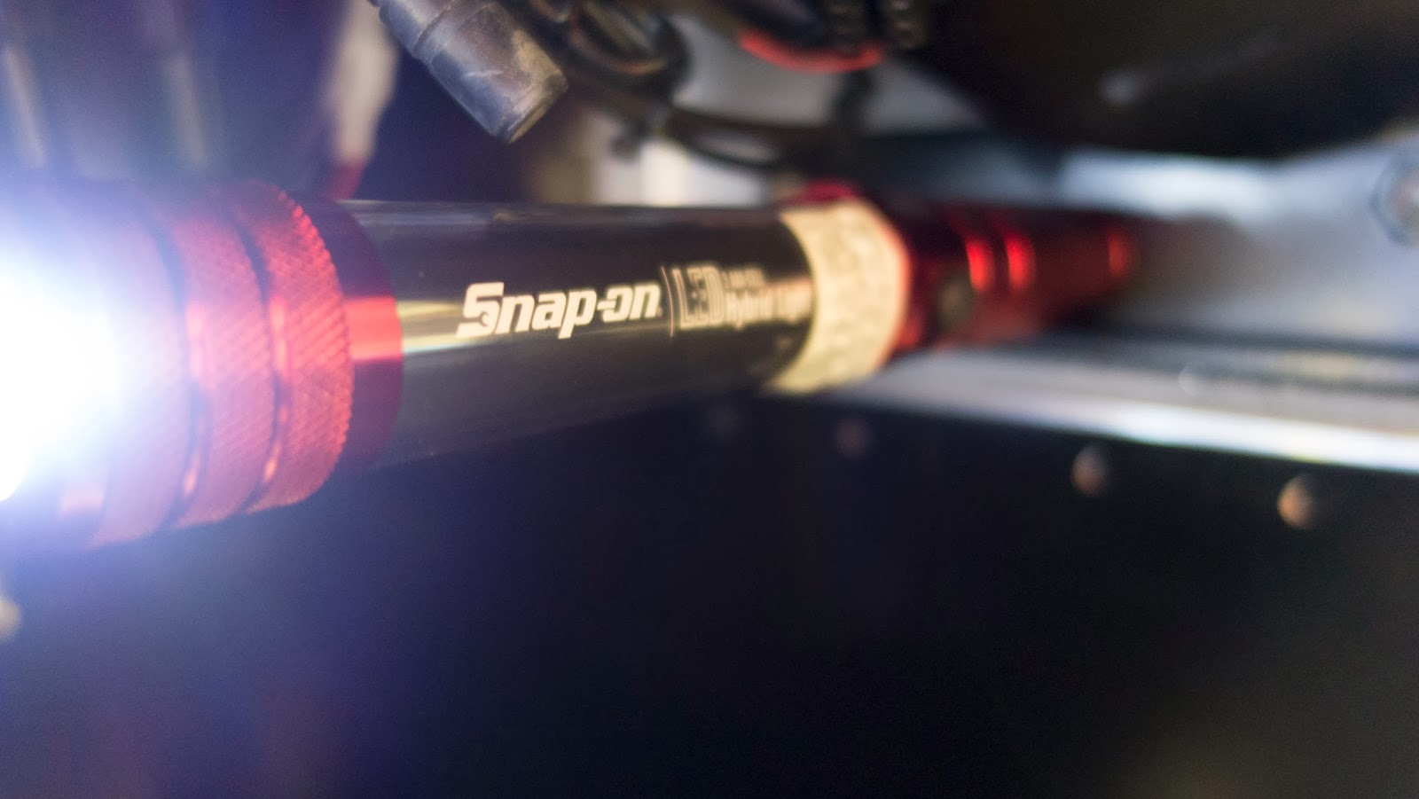 A Snap-on LED light and torch that I got from my mate Lee for my birthday.  It was a cool gift, until today when it became an UBER cool gift as it has a magnet in the base so sticks to the chassis perfectly - no need for another pair of hands!