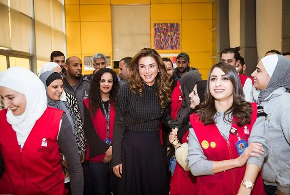 Queen Rania wore A.W.A.K.E. Unbutton Me please top. Queen visited exhibits at the Children’s Museum before attending its board meeting