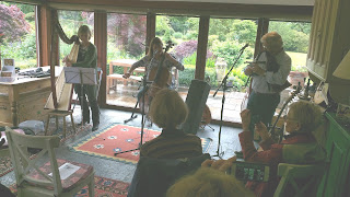scottish harp tour musicians doing a mini concert at lock lamond