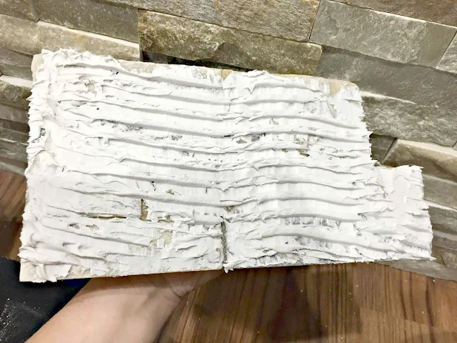 how to add adhesive to tile