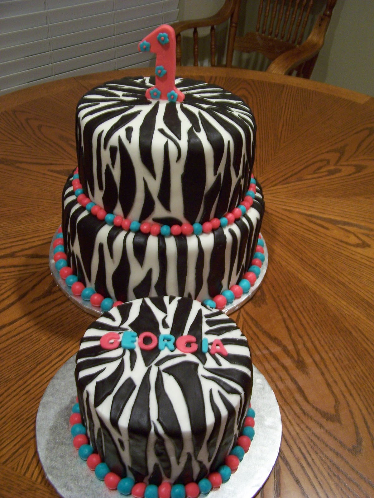 Heather Calvin Cakes First birthday cake with zebra print