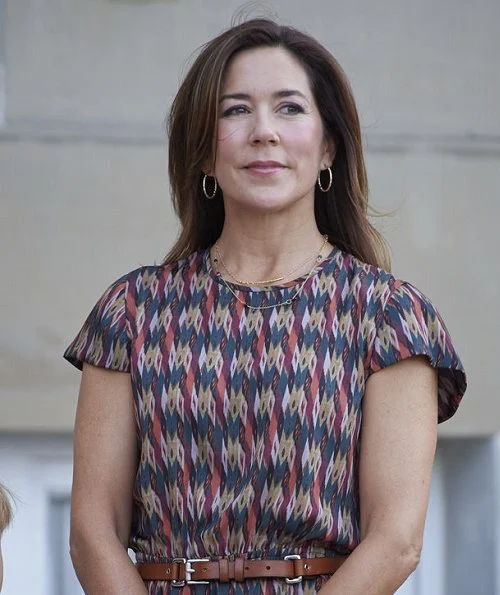 Crown Princess Mary's youngest children, Prince Vincent and Princess Josephine started Tranegård School. Mary wore dress