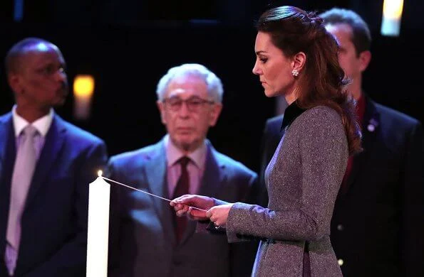 The Duchess wore a dress by Catherine Walker. Kate Middleton wore Catherine Walker dress for the UK's Holocaust Memorial Day Ceremony