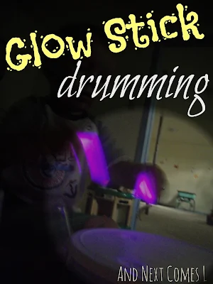 Glow stick drumming from And Next Comes L