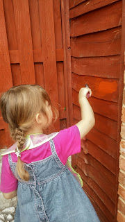 taking care painting the fence