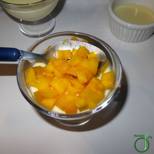 Morsels of Life - Mango Panna Cotta Step 6 - Meanwhile, cut the mango into a small dice, and spoon on top of the set panna cotta.