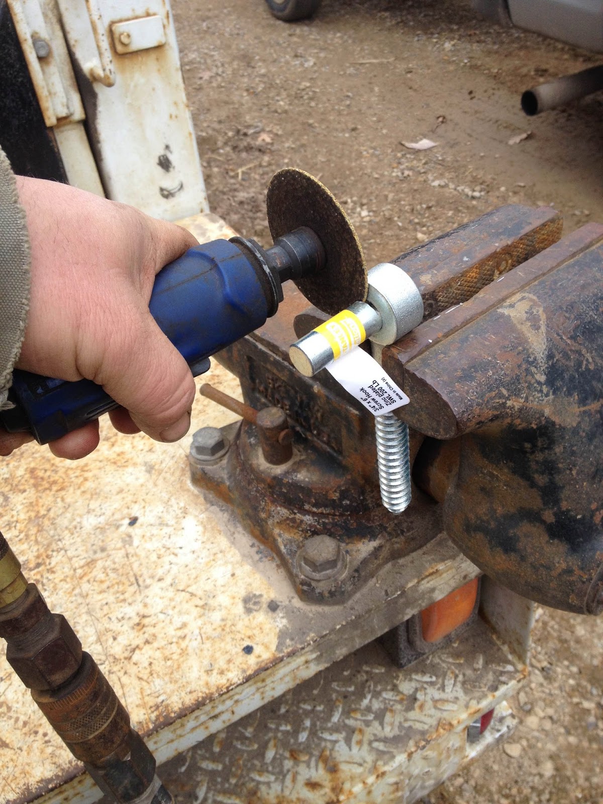 A Catholic Mechanic Make a screw in log grabber for a few bucks