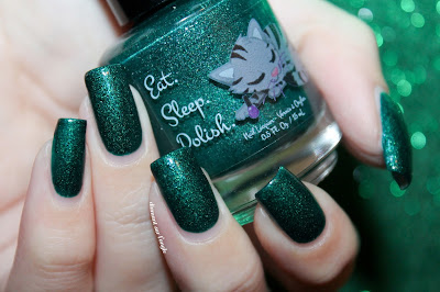 Swatch of the nail polish "Glowing Green Gates" from Eat Sleep Polish