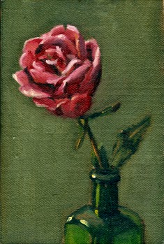 Oil painting of an opened pink rose blossom protruding from the next of an antique green bottle.