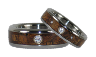 http://www.titaniumringshop.com/diamond-titanium-ring-set-with-tiger-wood-inlays-p-847.html