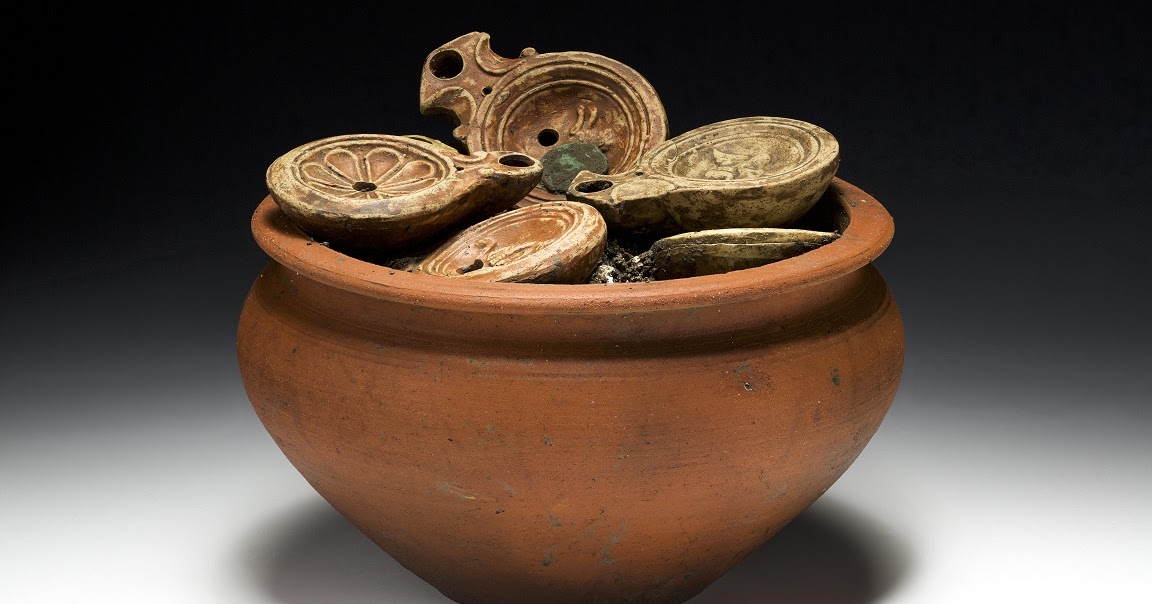 Roman pot filled with lamps and bronze coins found in Switzerland The