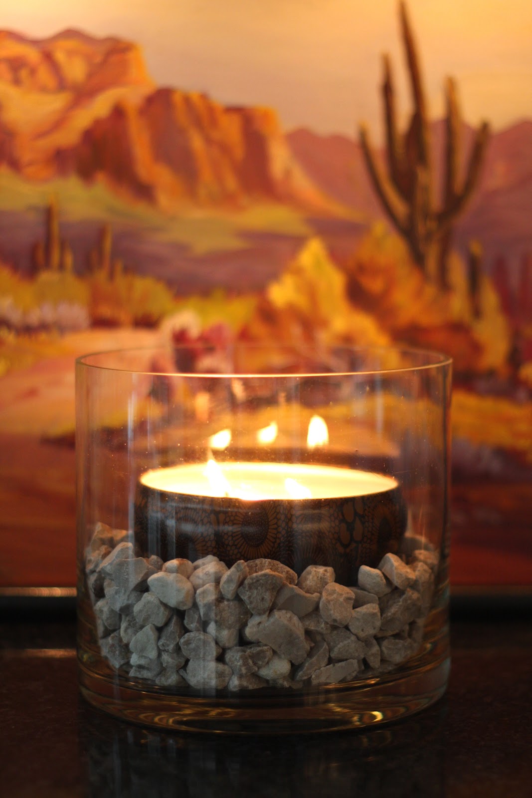 Christie Chase 480...glass, rock, candle