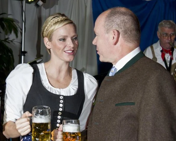 Prince Albert and Princess Charlene attend the opening of the 7th Oktoberfest at the Cafe de Paris at Place of Casino