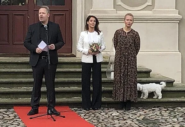 Princess Marie wore a tricotine jacket by Emporio Armani, and a new silk blouse by Hugo Boss