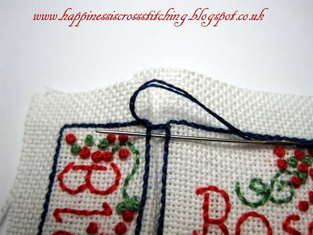 Cross stitched cottage with french knots a tutorial showing how to finish into a mattress pincushion