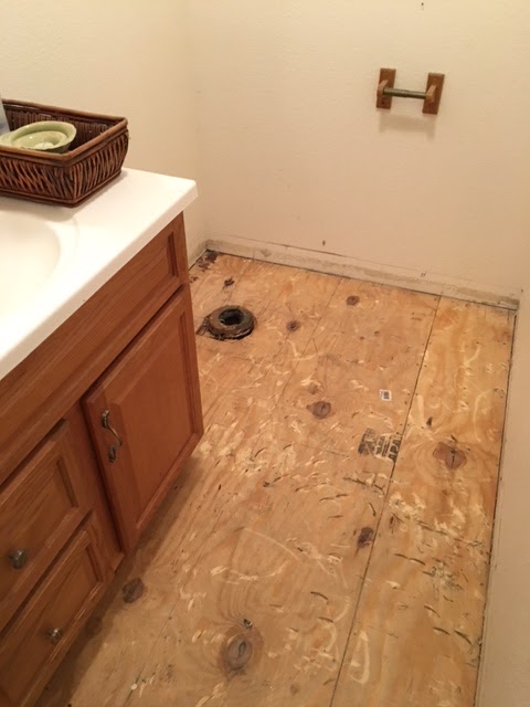 Half Bathroom getting new flooring