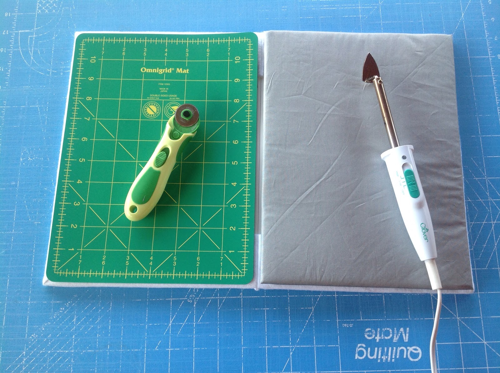Cutting mat board with a handheld mat board cutter