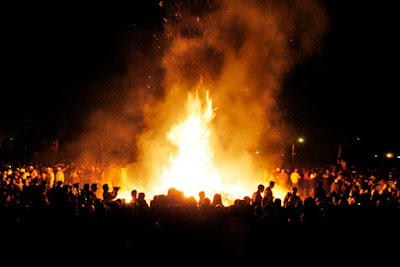 A very large fire surrounded by Zorostrians in Sadeh festival in Iran.