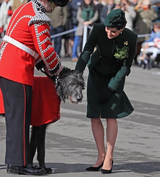 Alexander McQueen deep green coatdress, Kiki tourmaline earrings, Gianvito Rossi pumps