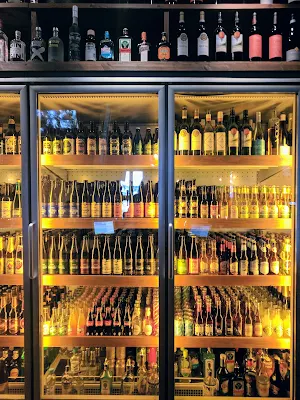 Finland Road Trip Itinerary: Beer refrigerator at Porvoon Paahtimo in Porvoo