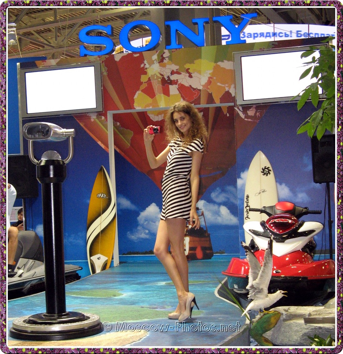 Slim Sony model in mini dress