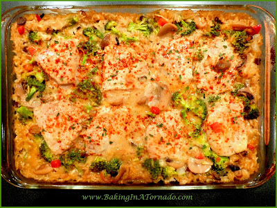 Pork Chop Dinner Casserole: A one dish flavorful and filling dinner. Easy to prepare on a busy night, just mix and bake. | recipe developed by www.BakingInATornado.com |#recipe #dinner #casserole