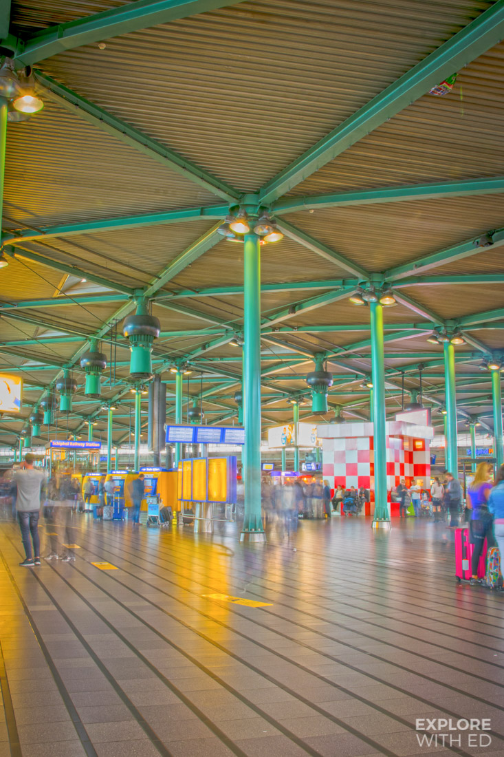 Departure Hall in Schiphol Airport with restaurants and shops