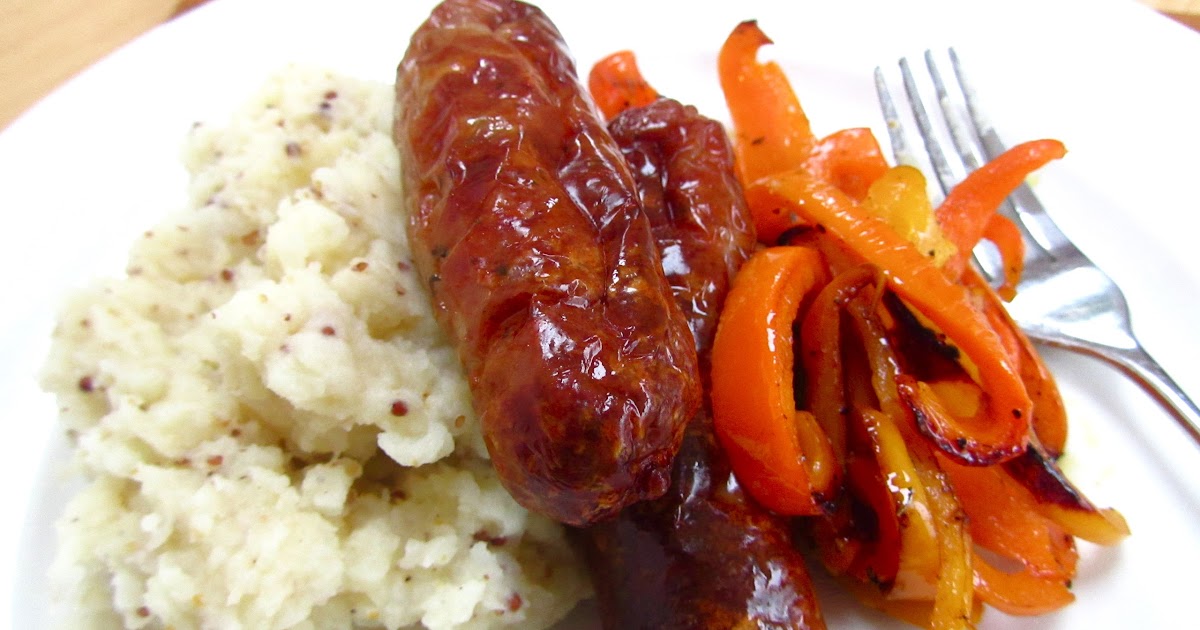 Sausages with mustard mash and sweet and sour peppers