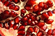 Autumn Treats. Delicious Organic Pomegranate (open pomegranate close up)