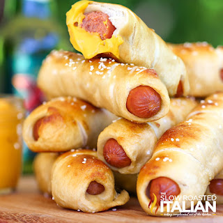 pile of hot dogs baked in bread dough